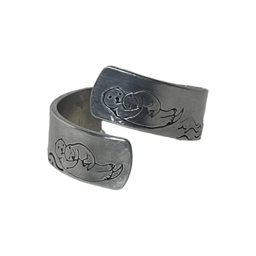 Handmade 8 stamped sea otter silver hypoallergenic aluminum adjustable wrap ring